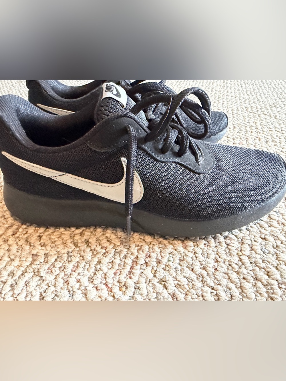 Nike Black and White Running Shoes with Swoosh Detail